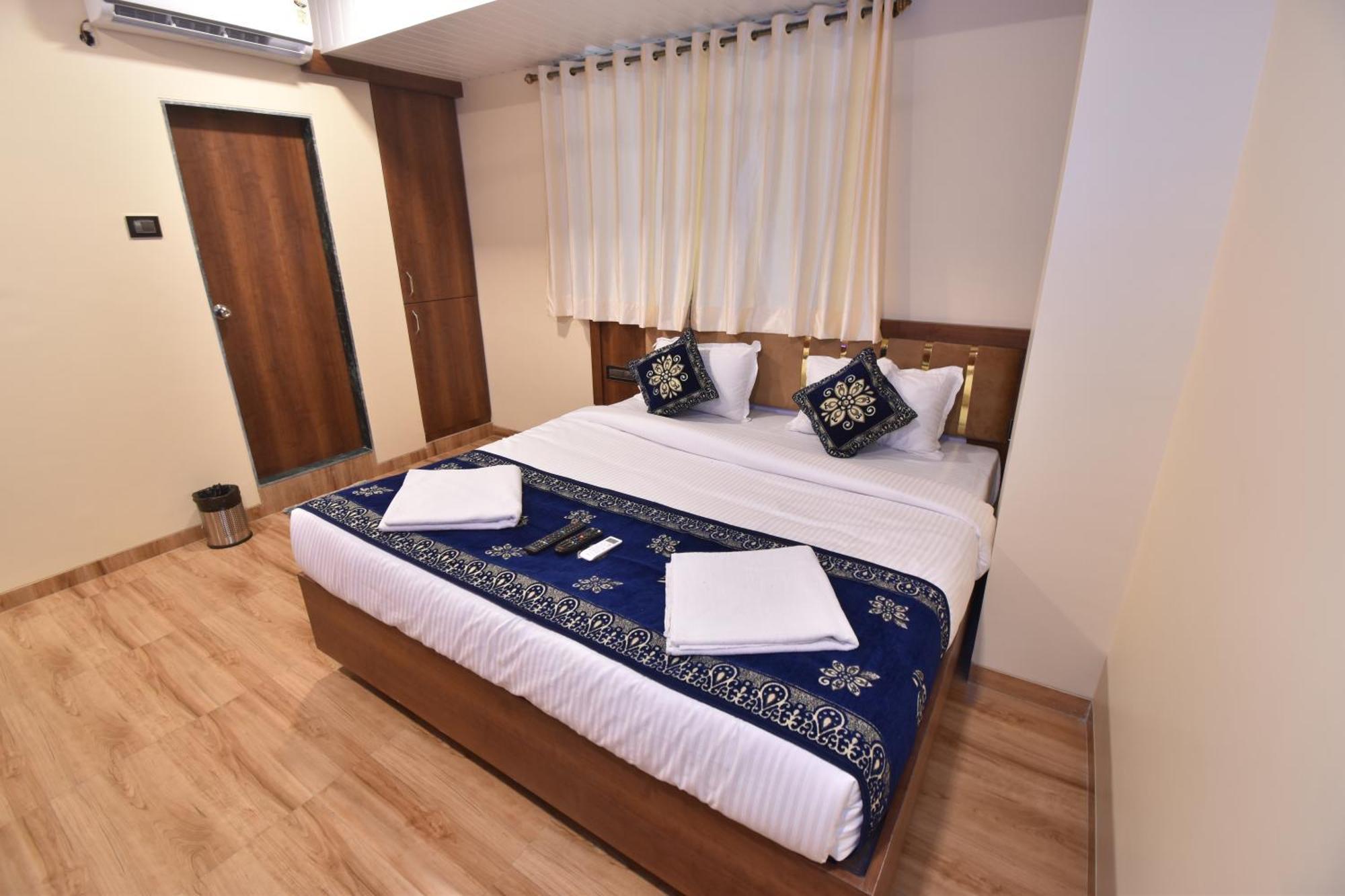 Hotel Starlit Наві-Мумбаї Номер фото